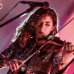 Thana Alexa Playing Violin with Migration Mexico 2019